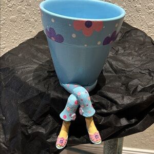 WHIMSICAL BLUE FLOWER POT WITH CROSSED LEGS PLATFORM-never used
